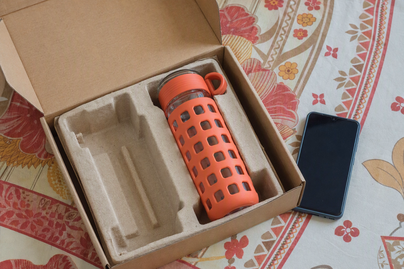 Opened protective bottle package ready for support photos