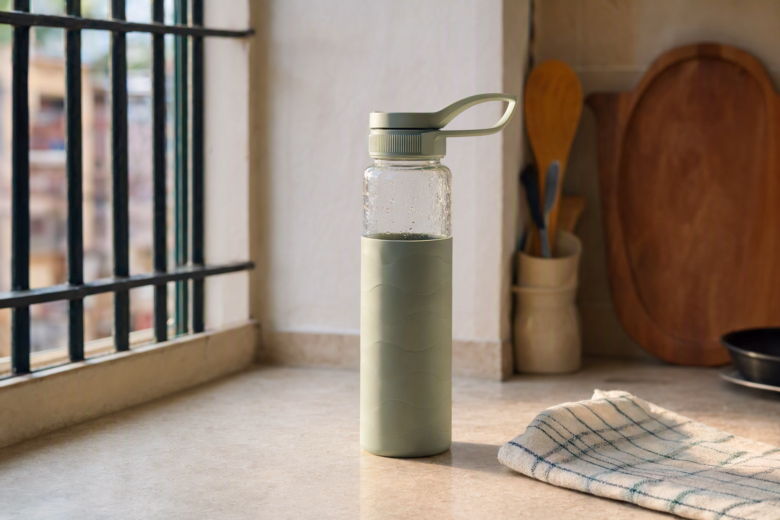 Clean Jolora bottle drying upright with parts separated